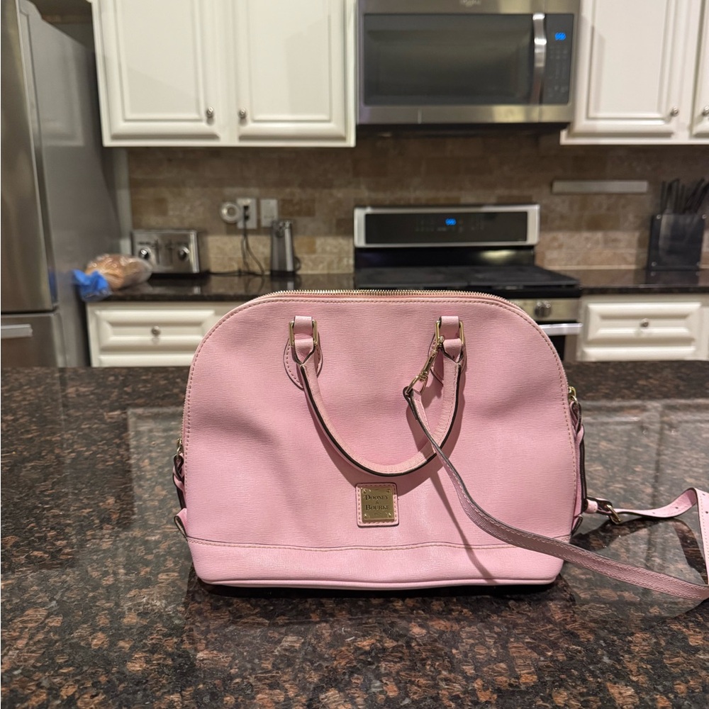 Dooney and bourke purse with matching wallet.